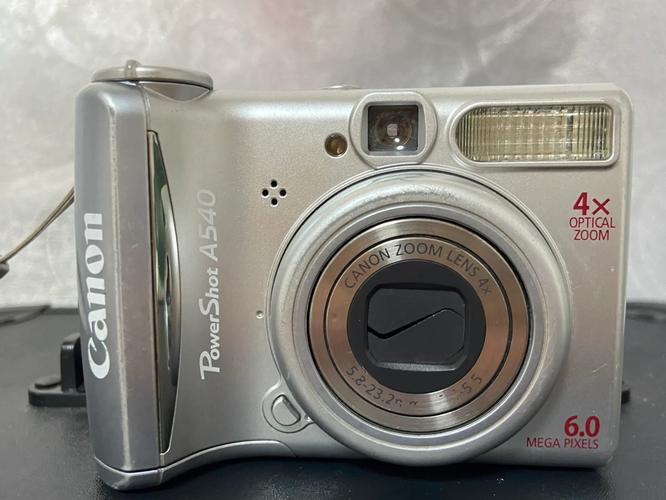 佳能a540怎么装电池，佳能a540怎么装电池图解