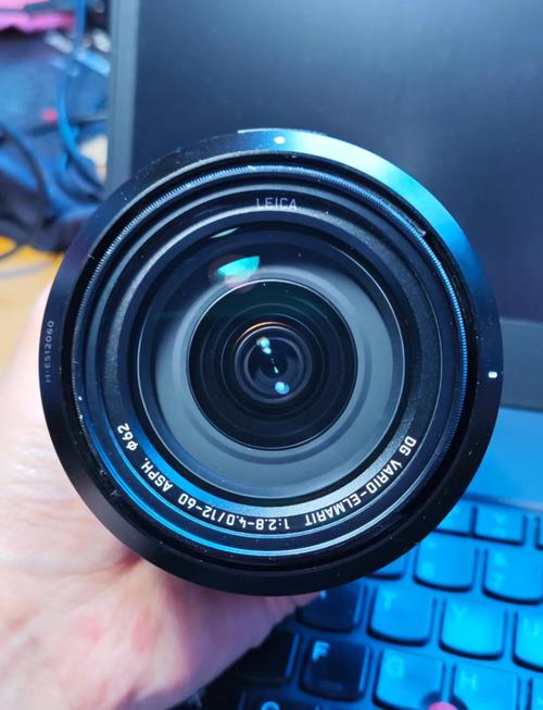 松下1260镜头适合拍什么？松下1260相当于佳能什么镜头？