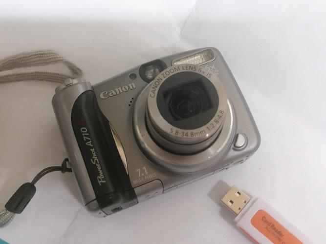 佳能a710is纽扣电池，佳能a720is电池槽在哪？