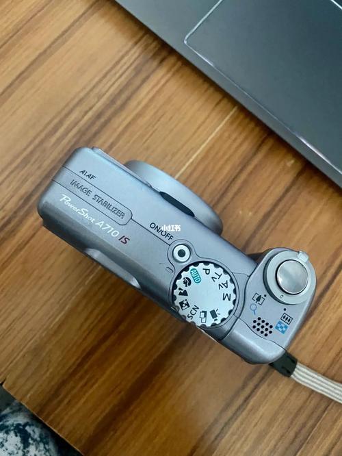 佳能a710is纽扣电池，佳能a720is电池槽在哪？-第3张图片-优品飞百科